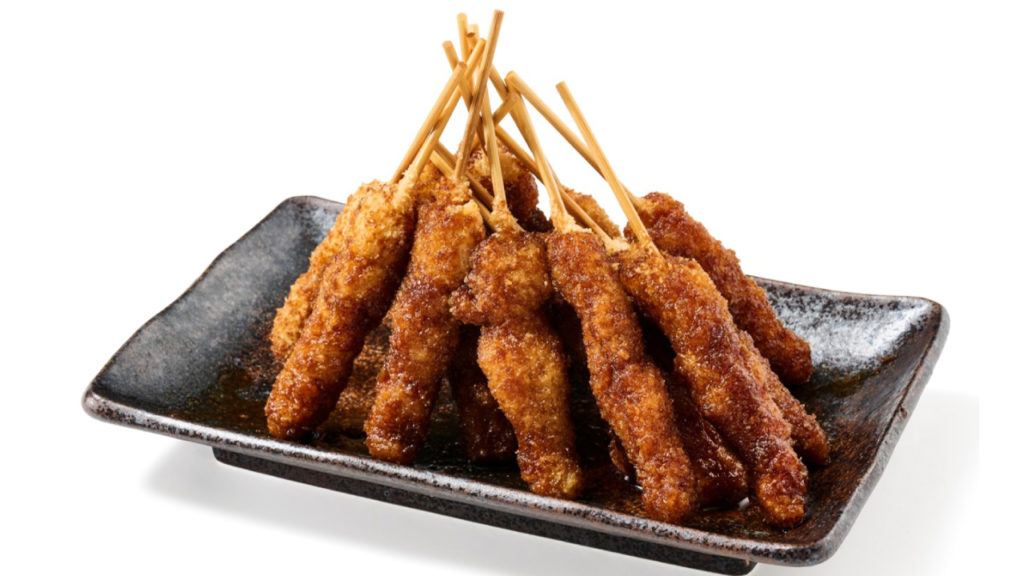 無限ニンニクホルモン串の画像